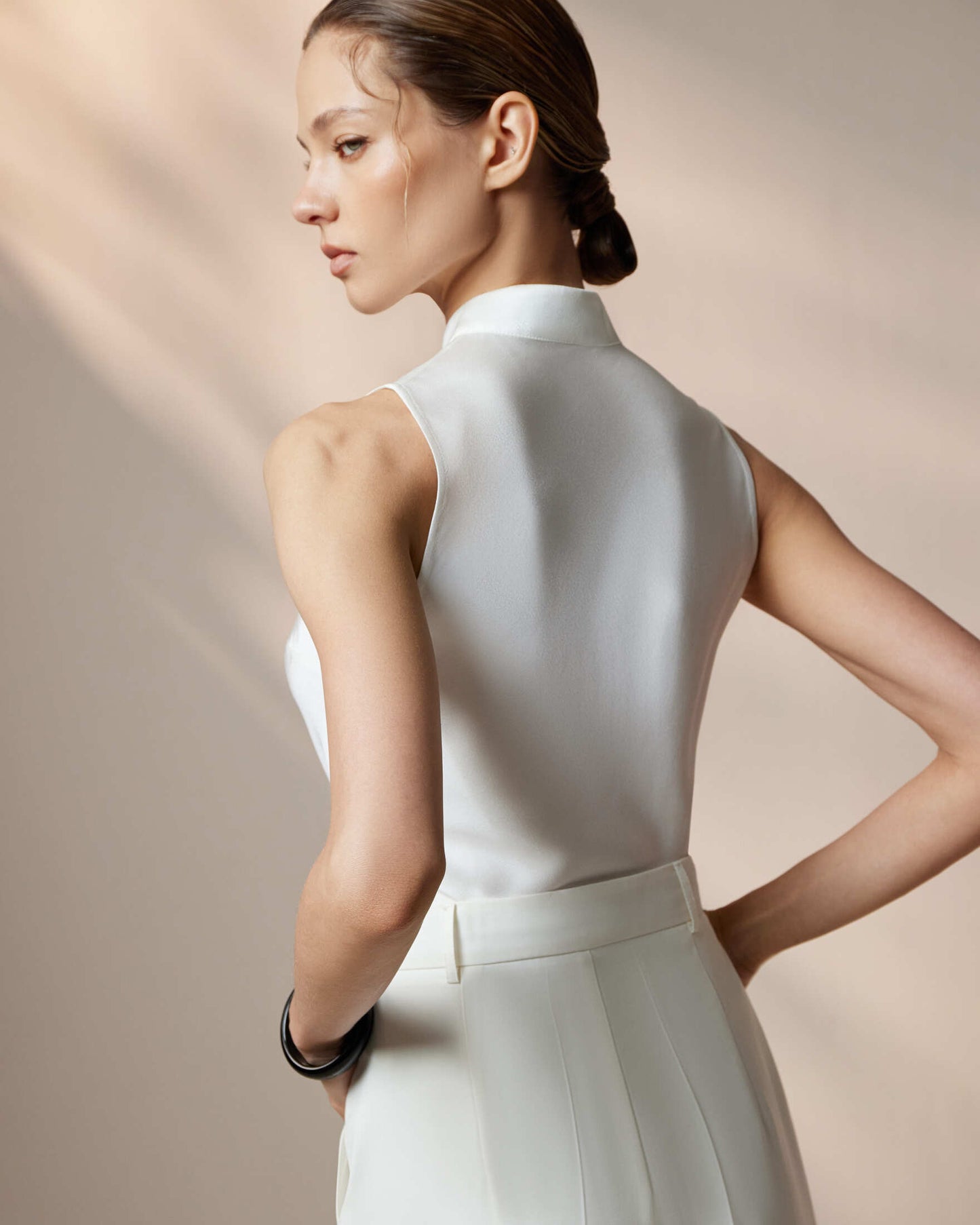 Top with shaped neckline