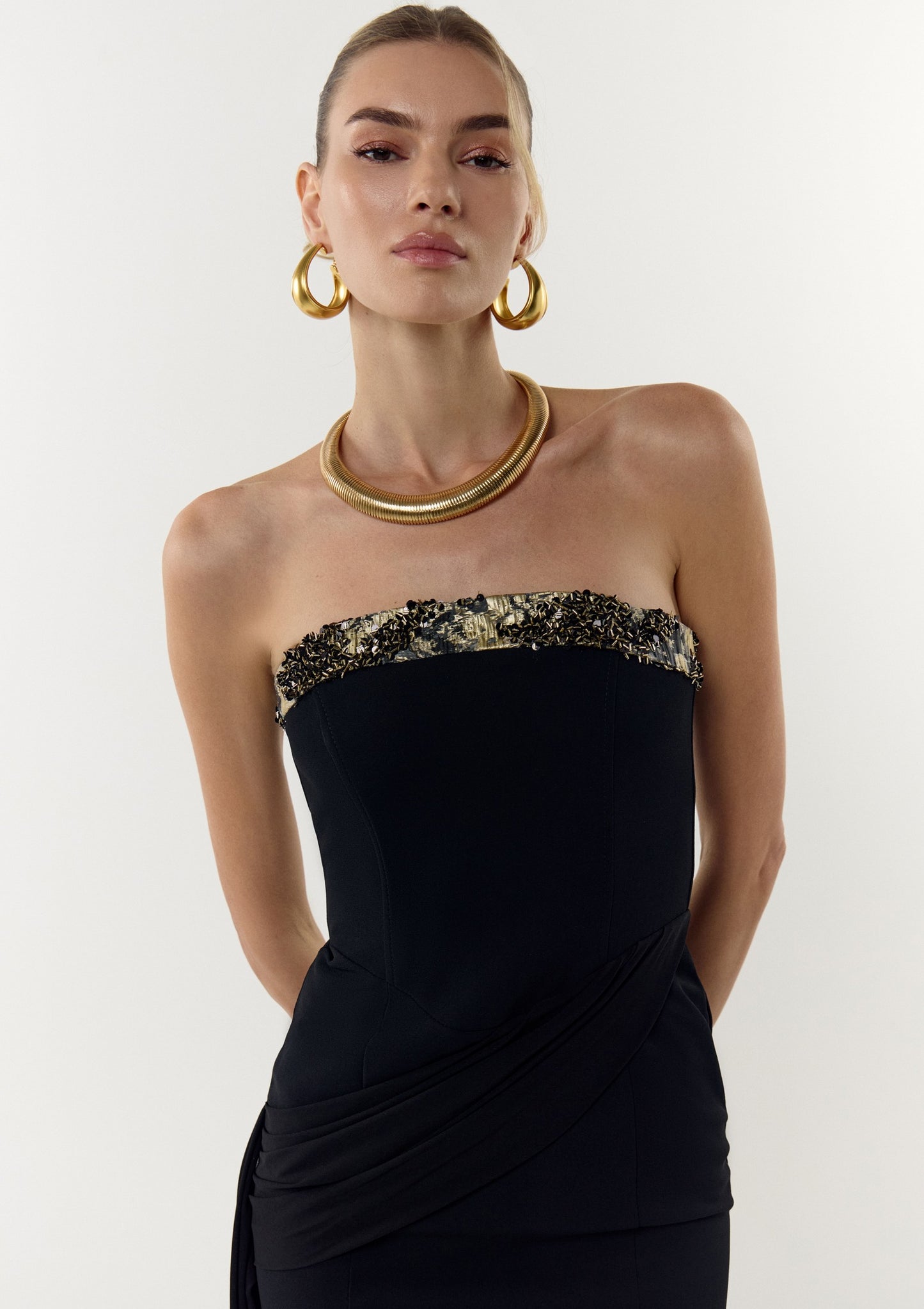 Mini dress with a removable cape